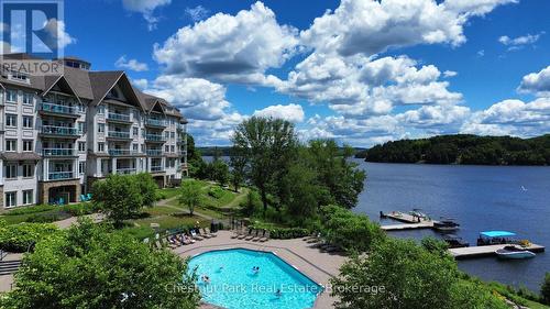 316 - 25 Pen Lake Point Road, Huntsville (Chaffey), ON - Outdoor With Body Of Water With In Ground Pool With View