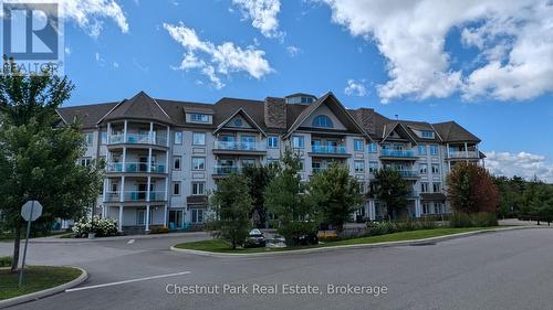 316 - 25 Pen Lake Point Road, Huntsville (Chaffey), ON - Outdoor With Balcony With Facade