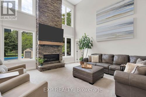 8037 Springwater Road, Aylmer, ON - Indoor Photo Showing Living Room With Fireplace