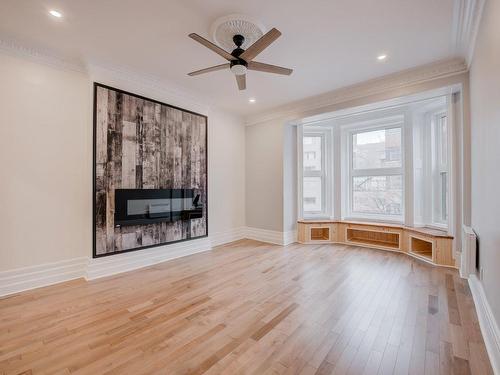 Living room - 200-1572 Av. Summerhill, Montréal (Ville-Marie), QC - Indoor With Fireplace