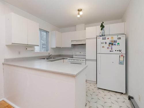 Kitchen - 91 Rue De Neuville, L'Île-Perrot, QC - Indoor Photo Showing Kitchen With Double Sink