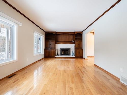 Salon - 1740 Crois. Seguin, Brossard, QC - Indoor Photo Showing Living Room With Fireplace