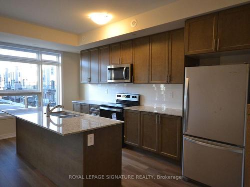 116-1597 Rose Way, Milton, ON - Indoor Photo Showing Kitchen With Stainless Steel Kitchen With Double Sink