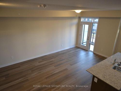 116-1597 Rose Way, Milton, ON - Indoor Photo Showing Other Room