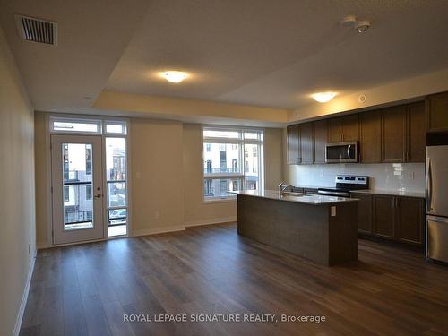 116-1597 Rose Way, Milton, ON - Indoor Photo Showing Kitchen With Stainless Steel Kitchen