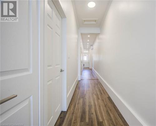 Corridor to bedrooms, laundry, bathroom and deck - 28 Main Street Unit# 1, Cambridge, ON - Indoor Photo Showing Other Room