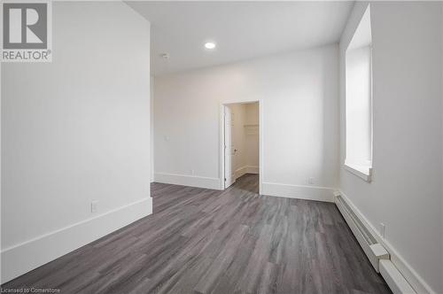 Second Bedroom L-shaped with large walk-in closet. - 28 Main Street Unit# 1, Cambridge, ON - Indoor Photo Showing Other Room