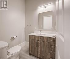 Main 3-piece bathroom with tile floors. - 