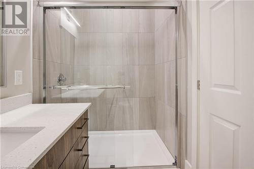 Main Bath tiled shower with glass doors. - 28 Main Street Unit# 1, Cambridge, ON - Indoor Photo Showing Bathroom