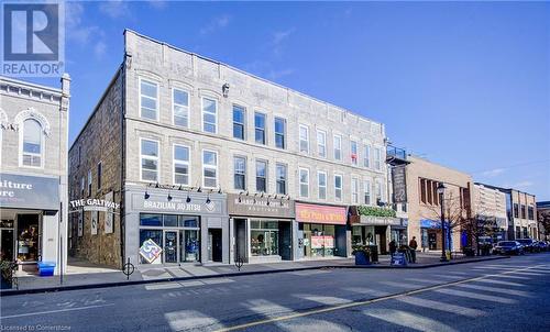 View of building exterior - 28 Main Street Unit# 1, Cambridge, ON - Outdoor With Facade