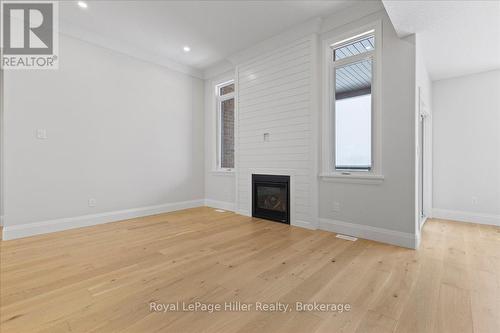 74 Pugh Street, Perth East (Milverton), ON - Indoor Photo Showing Other Room With Fireplace