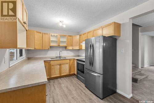 26 1128 Mckercher Drive, Saskatoon, SK - Indoor Photo Showing Kitchen With Stainless Steel Kitchen With Double Sink