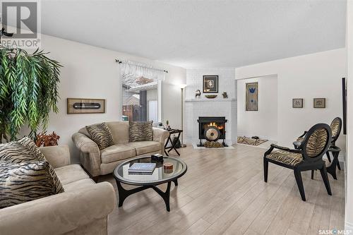 229 Churchill Drive, Saskatoon, SK - Indoor Photo Showing Living Room With Fireplace