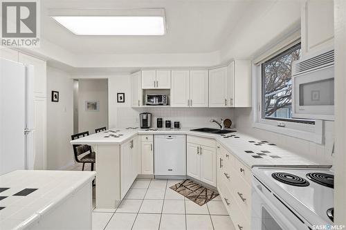 229 Churchill Drive, Saskatoon, SK - Indoor Photo Showing Kitchen With Double Sink