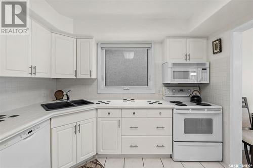 229 Churchill Drive, Saskatoon, SK - Indoor Photo Showing Kitchen With Double Sink