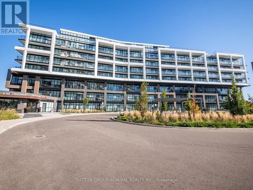 314 - 60 George Butchart Drive, Toronto, ON - Outdoor With Balcony With Facade