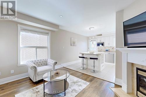 37 Del Francesco Way, Vaughan, ON - Indoor Photo Showing Living Room With Fireplace