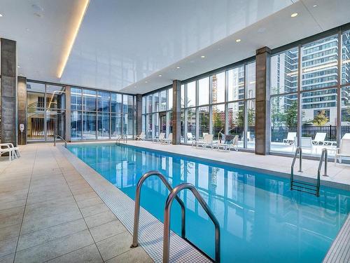 Piscine - 1705-1450 Boul. René-Lévesque O., Montréal (Ville-Marie), QC - Indoor Photo Showing Other Room With In Ground Pool