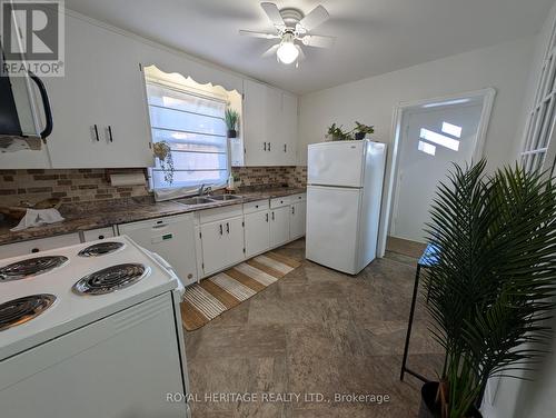 9 Prince Street, Clarington (Bowmanville), ON - Indoor Photo Showing Kitchen With Double Sink