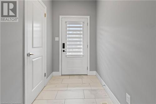 View of doorway to outside - 1023 Devonshire Avenue Unit# 5, Woodstock, ON - Indoor Photo Showing Other Room