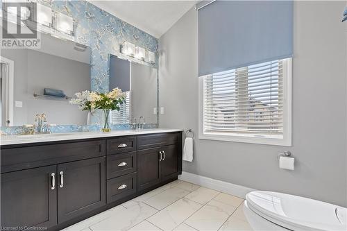 Bathroom with vanity and toilet - 1023 Devonshire Avenue Unit# 5, Woodstock, ON - Indoor Photo Showing Bathroom