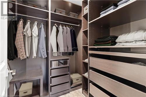 Walk in closet featuring light hardwood / wood-style floors - 1023 Devonshire Avenue Unit# 5, Woodstock, ON - Indoor With Storage