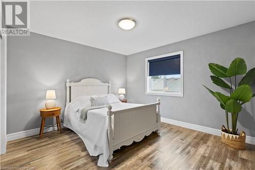 Bedroom with wood-type flooring - 1023 Devonshire Avenue Unit# 5, Woodstock, ON - Indoor Photo Showing Bedroom