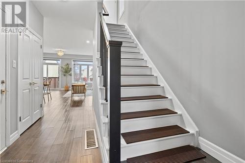 Stairs featuring wood-type flooring - 1023 Devonshire Avenue Unit# 5, Woodstock, ON - Indoor Photo Showing Other Room