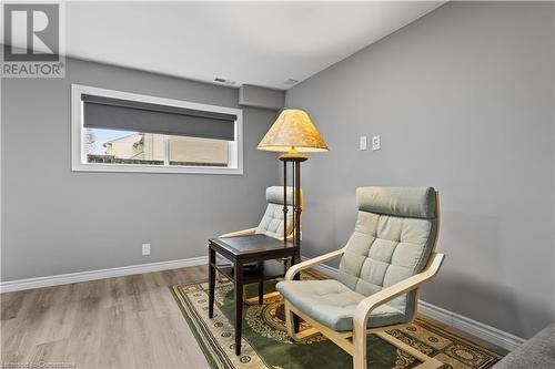 Living area with light hardwood / wood-style flooring - 1023 Devonshire Avenue Unit# 5, Woodstock, ON - Indoor Photo Showing Other Room