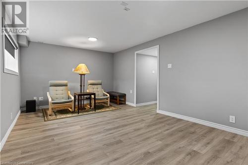 Living area with light hardwood / wood-style flooring - 1023 Devonshire Avenue Unit# 5, Woodstock, ON - Indoor Photo Showing Other Room