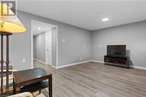 Living room with light wood-type flooring - 1023 Devonshire Avenue Unit# 5, Woodstock, ON - Indoor