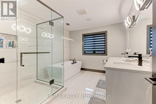 Custom tile and cabinetry work - 86 Optimist Drive, Southwold (Talbotville), ON - Indoor Photo Showing Bathroom