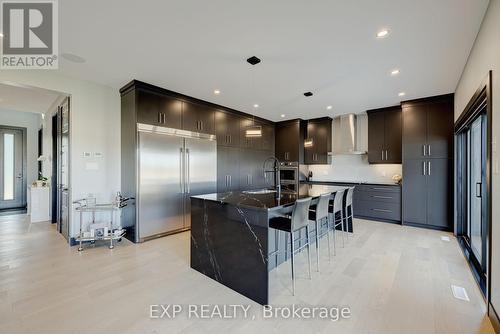 Designer custom luxury kitchen cabinetry & counter - 86 Optimist Drive, Southwold (Talbotville), ON - Indoor Photo Showing Kitchen