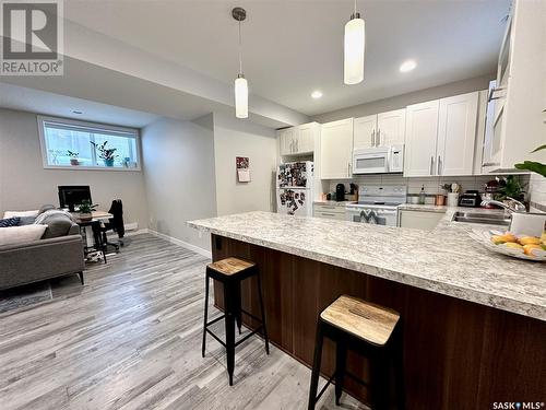 514 Isabella Street E, Saskatoon, SK - Indoor Photo Showing Kitchen With Double Sink