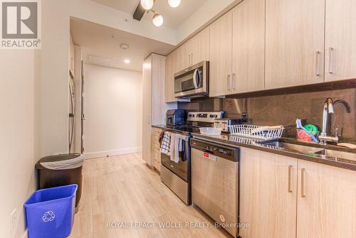 1210 - 145 Columbia Street W, Waterloo, ON - Indoor Photo Showing Kitchen With Double Sink