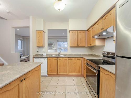 22-7155 Magistrate Terr, Mississauga, ON - Indoor Photo Showing Kitchen With Double Sink