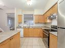 22-7155 Magistrate Terr, Mississauga, ON  - Indoor Photo Showing Kitchen With Double Sink 