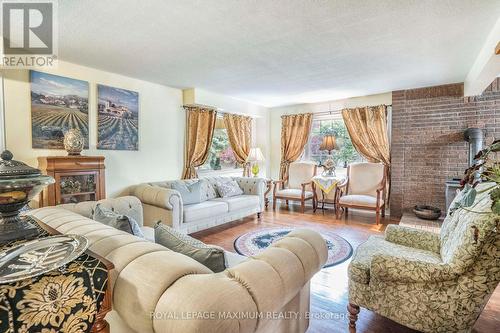 4372 Train Street, New Tecumseth, ON - Indoor Photo Showing Living Room With Fireplace