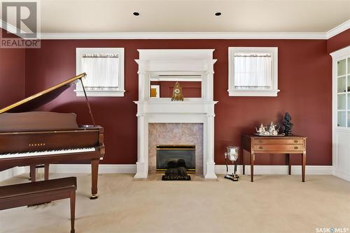 3658 Selinger Crescent, Regina, SK - Indoor With Fireplace