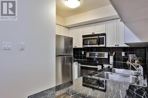 820 - 230 Queens Quay W, Toronto, ON - Indoor Photo Showing Kitchen With Stainless Steel Kitchen With Double Sink