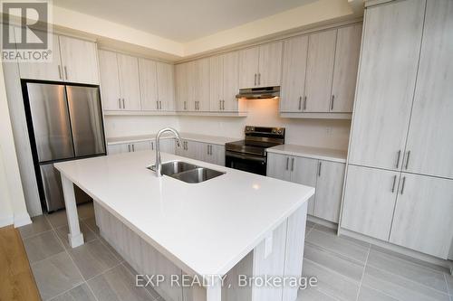 56 Bearberry Road, Springwater, ON - Indoor Photo Showing Kitchen With Double Sink