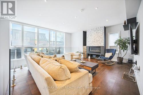 33 Edwin Avenue, Toronto, ON - Indoor Photo Showing Living Room With Fireplace