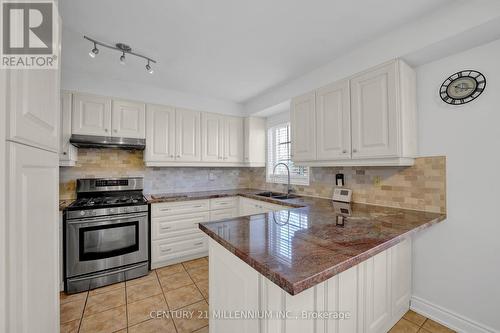 63 - 9800 Mclaughlin Road N, Brampton, ON - Indoor Photo Showing Kitchen With Double Sink