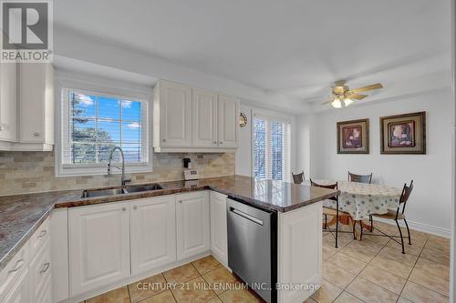 63 - 9800 Mclaughlin Road N, Brampton, ON - Indoor Photo Showing Kitchen With Double Sink