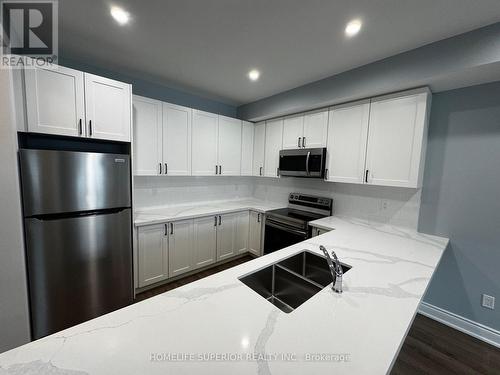 3 - 143 Gibbons Street, Oshawa (Mclaughlin), ON - Indoor Photo Showing Kitchen With Double Sink