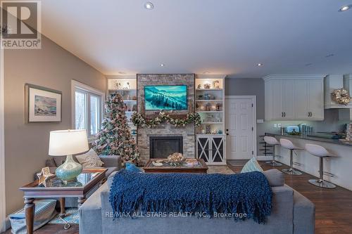 316 1/2 Riverside Drive, Kawartha Lakes (Bobcaygeon), ON - Indoor Photo Showing Living Room With Fireplace