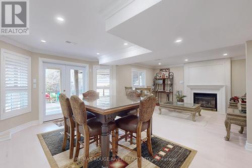 25 Linderwood Drive, Toronto, ON - Indoor Photo Showing Dining Room With Fireplace