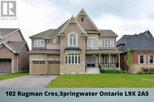 102 Rugman Crescent, Springwater, ON - Outdoor With Facade