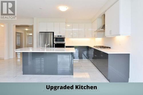 102 Rugman Crescent, Springwater, ON - Indoor Photo Showing Kitchen With Upgraded Kitchen