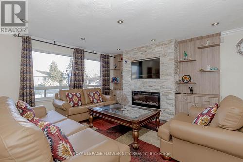 2 Alexandria Crescent, Brampton, ON - Indoor Photo Showing Living Room With Fireplace